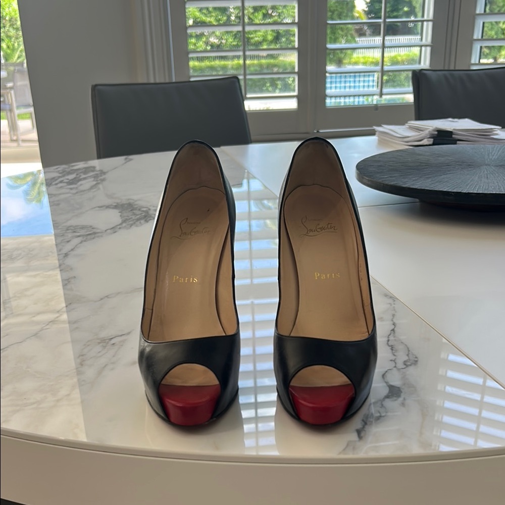 Christian Louboutin Black and Red Heels with Signature Red Sole